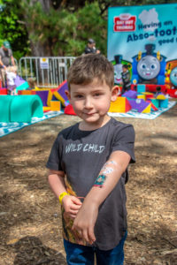 Boy Shows Off His Airbrush Tattoo At The Outdoor Play Pod At Day Out With Thomas
