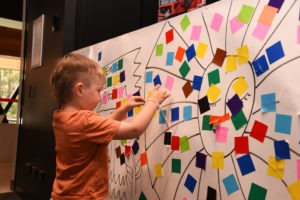 Boy enjoys the indoor play in the Lakeside Visitor Centre.