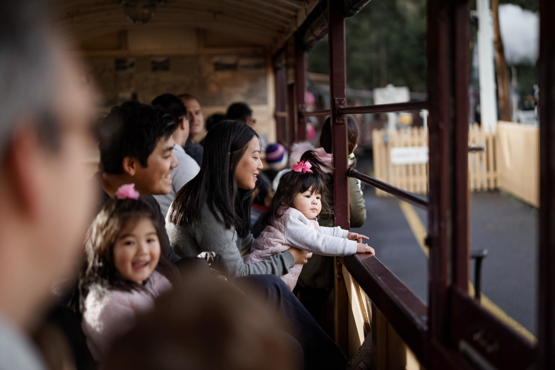 Family Departing Belgrave Station On Board