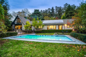 Heavenly Holidays' Sherbrooke Manor viewed from the garden, with the swimming pool at centre.