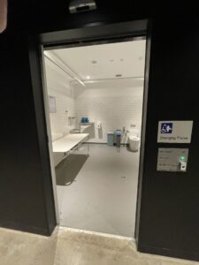 View from the hallway through the entrance door to the Changing Places facility in the Lakeside Visitor Centre.