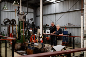 Puffing Billy Older Couple Looking At Steam Display At Menzies Creek Museum