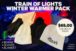 A collection of scarves, beanies and gloves. Text on the image says Train of Lights Winter Warmer Pack, and states that each pack costs $65 and includes a scarf, a beanie and a set of gloves.