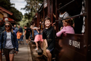 Young Boy Disembarking Carriage At Lakeside Station
