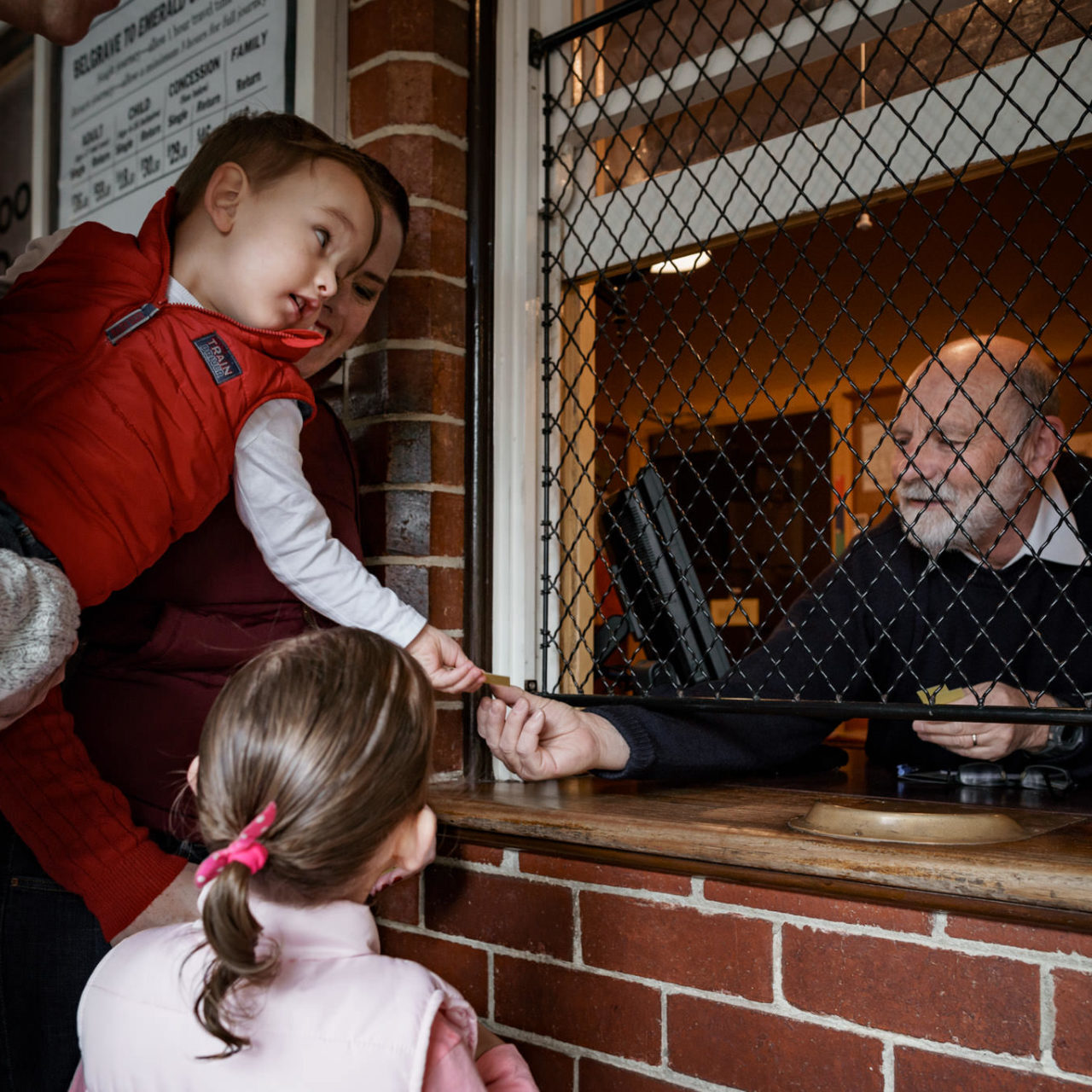 Getting Ticket From Volunteer At Booking Office